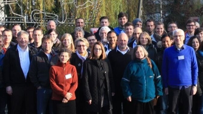 Image detail of group picture during JSMC meeting 2017 with focus on participating professors.